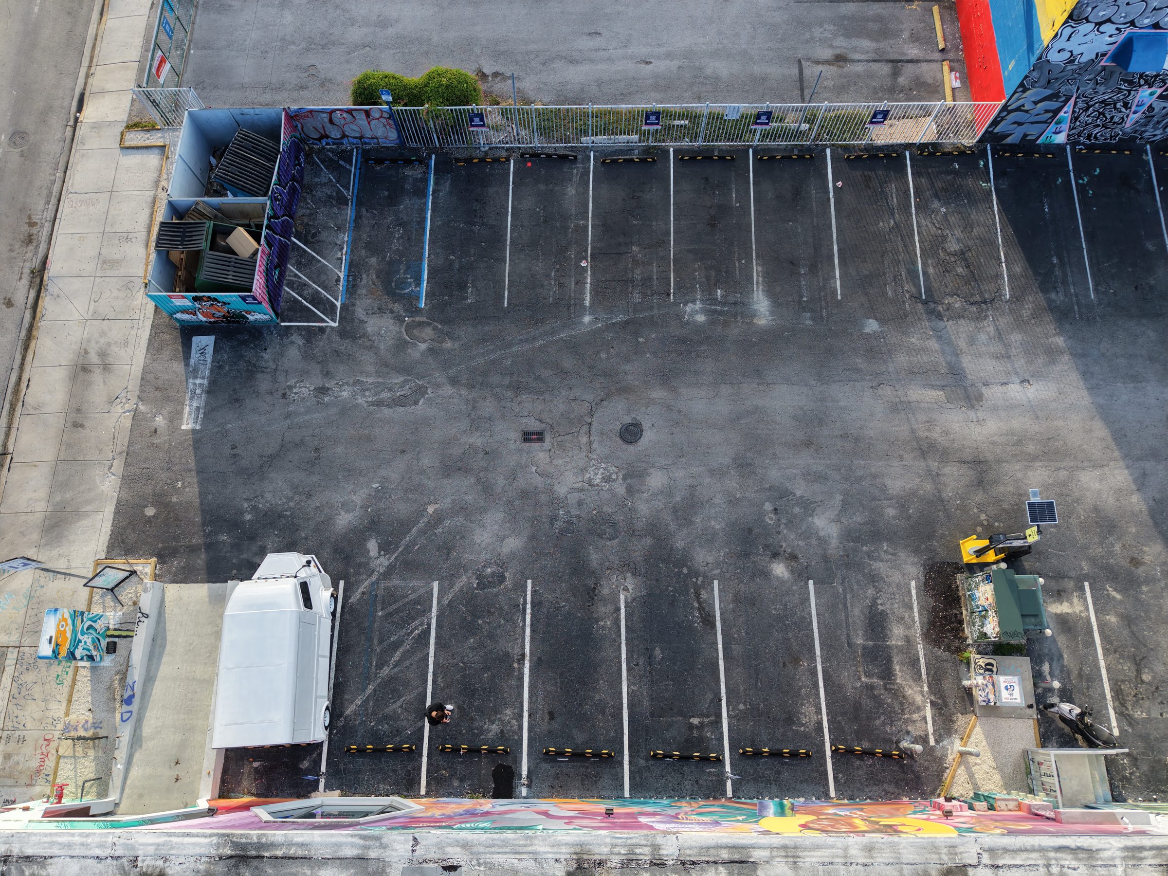 Overhead drone view of the 5,520 sq ft private parking lot at Encore Wynwood